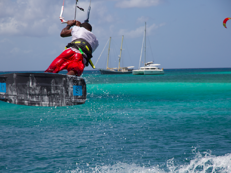 Local rider jump 800x600 - Uncharted Kitesurfing - Grenadines