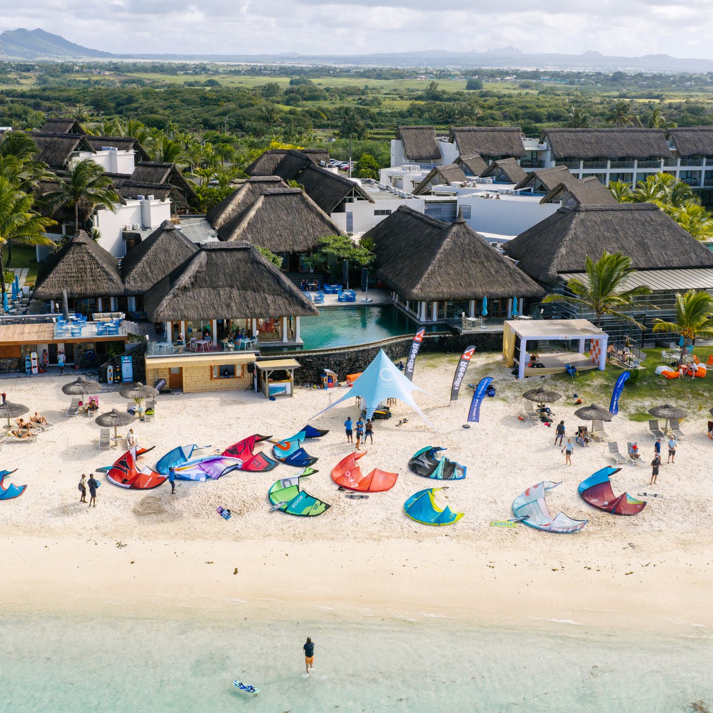 Kite centre beach with kites laid out